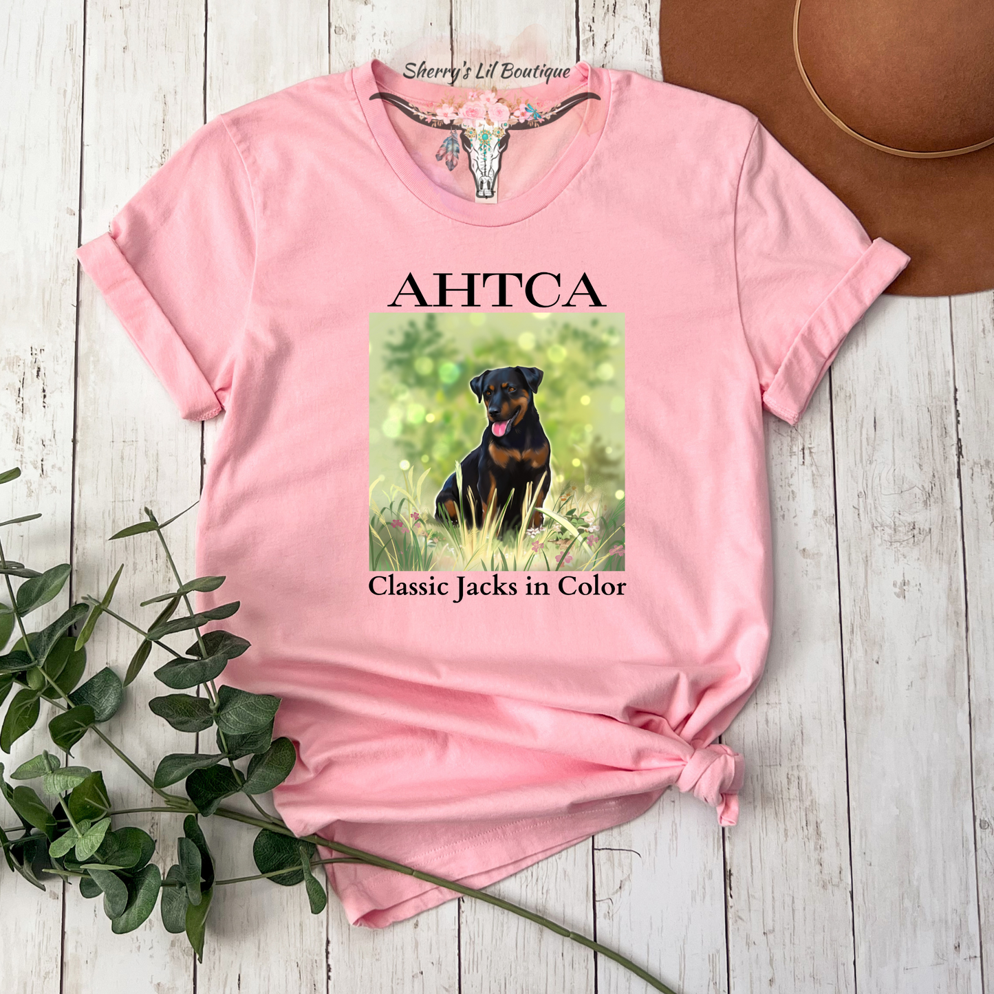 Pink short sleeve tee with AHTCA graphic design